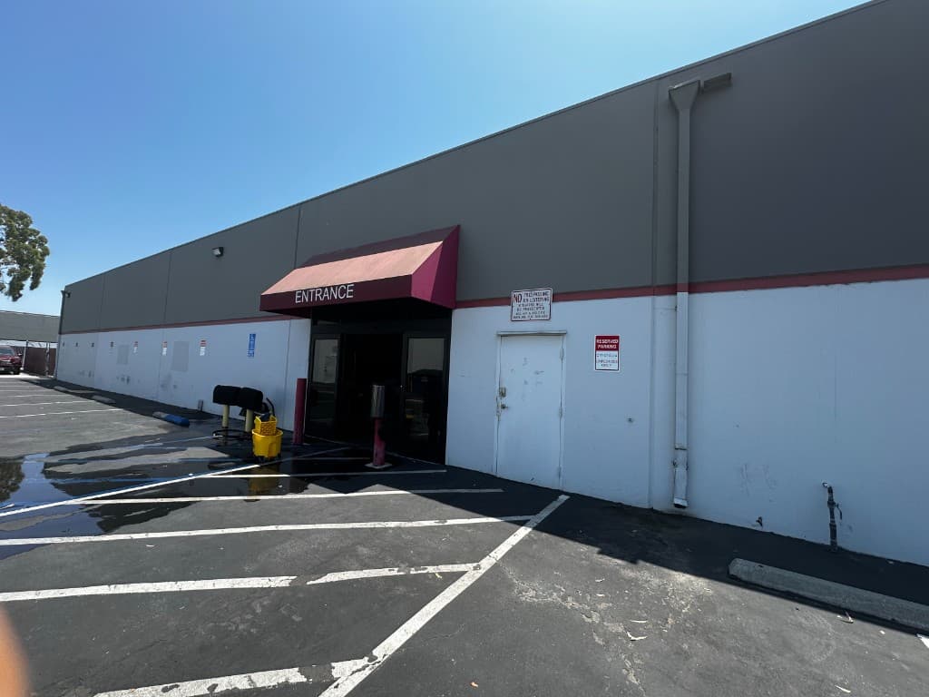 Long organized warehouse aisle stretching into the distance